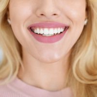 blonde-lady-showing-beautiful-white-teeth-cropped-2022-10-07-02-26-47-utc (1)