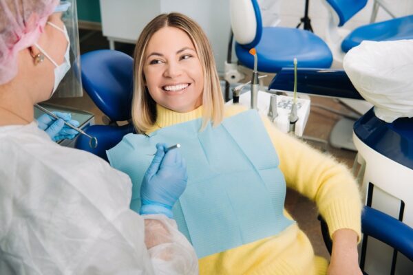 the-girl-smiles-at-the-dentist-and-looks-at-her-2021-12-13-19-35-06-utc (2)