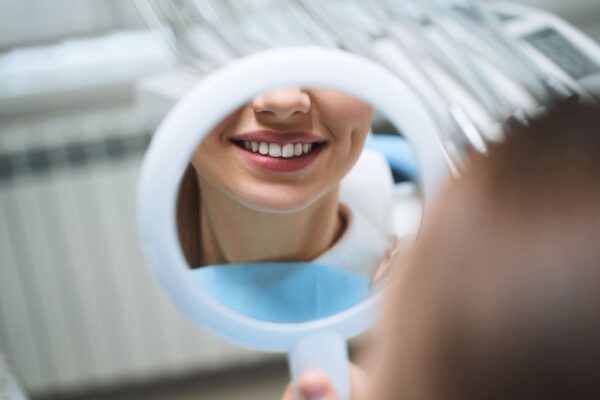 woman-with-mirror-at-dentist-stock-photo-2021-09-03-16-01-21-utc (2)